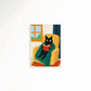Cuadro Decorativo Gato Negro Tapado Leyendo Sillón Amarillo
